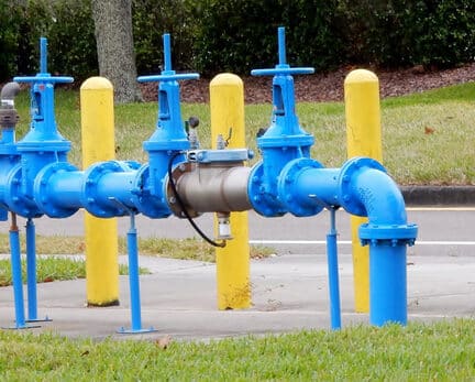 A plumbing system with a backflow prevention device installed to prevent water from flowing in the wrong direction.